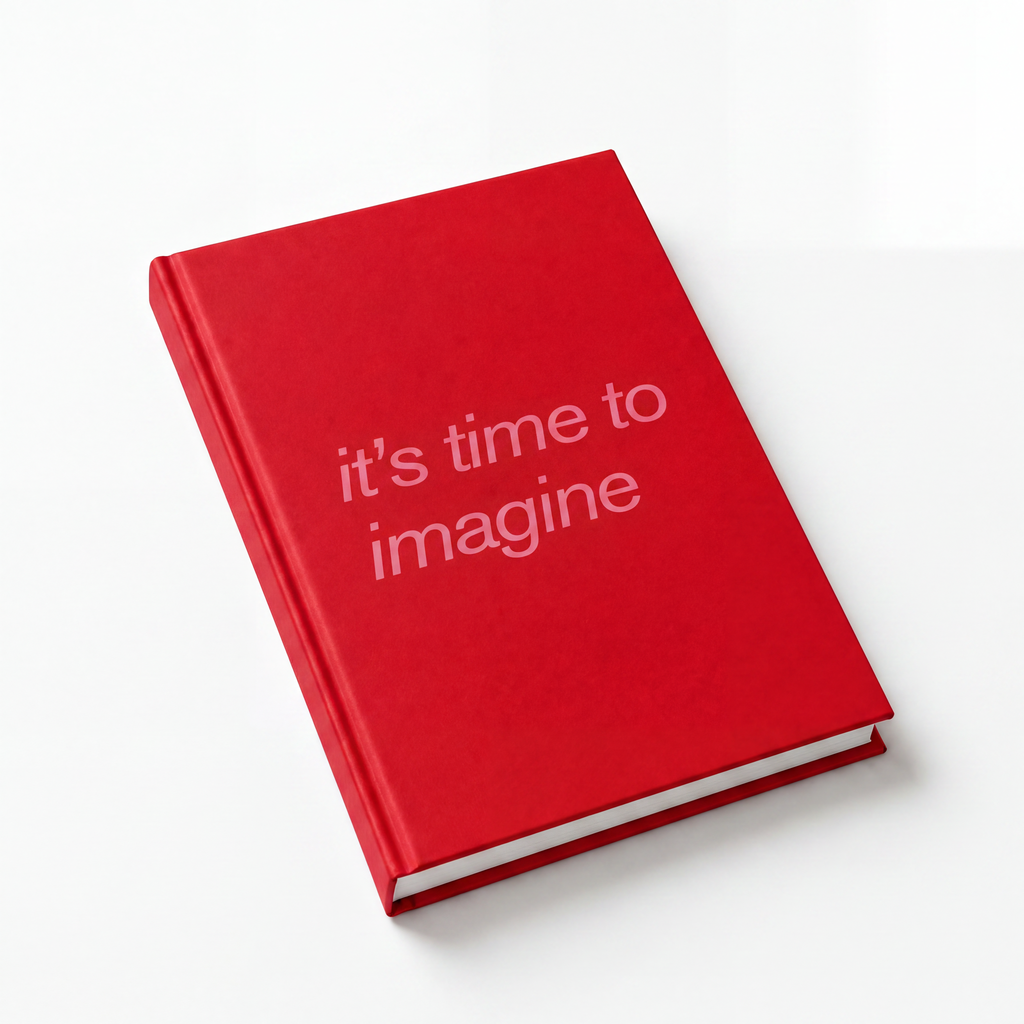Red journal with 'it's time to imagine' text on a white background