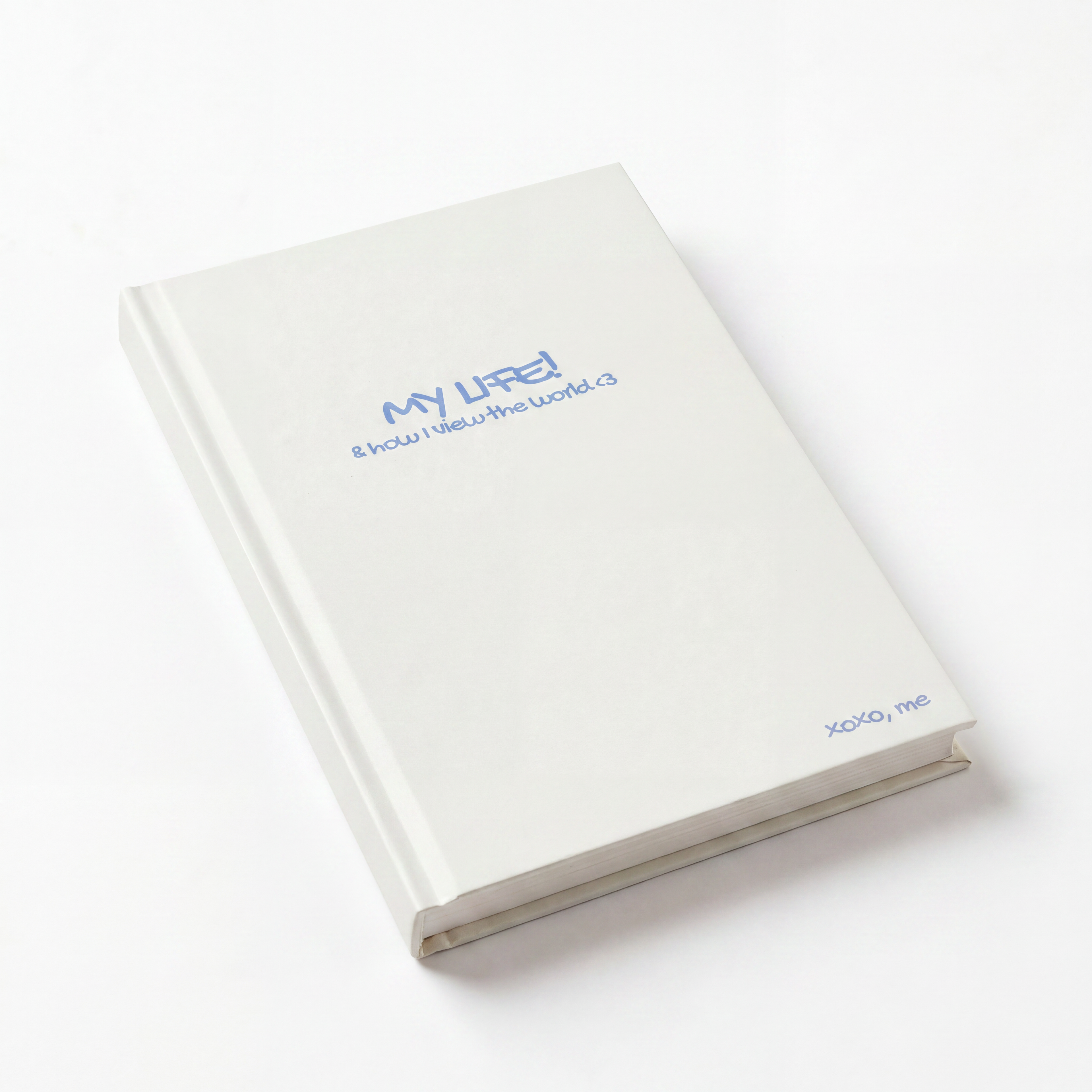 White notebook with blue text on a white background