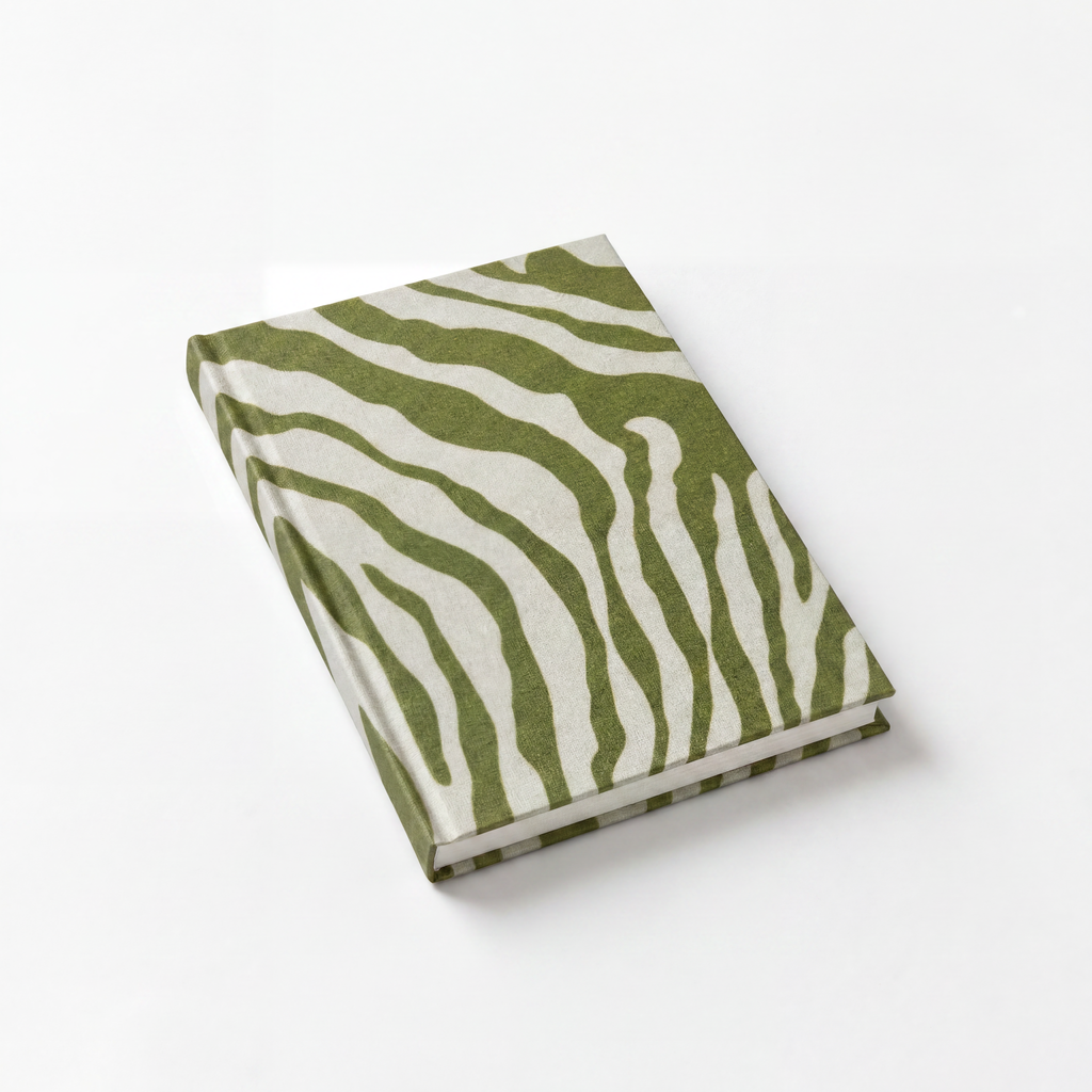 Notebook with green and white zebra pattern on a white background