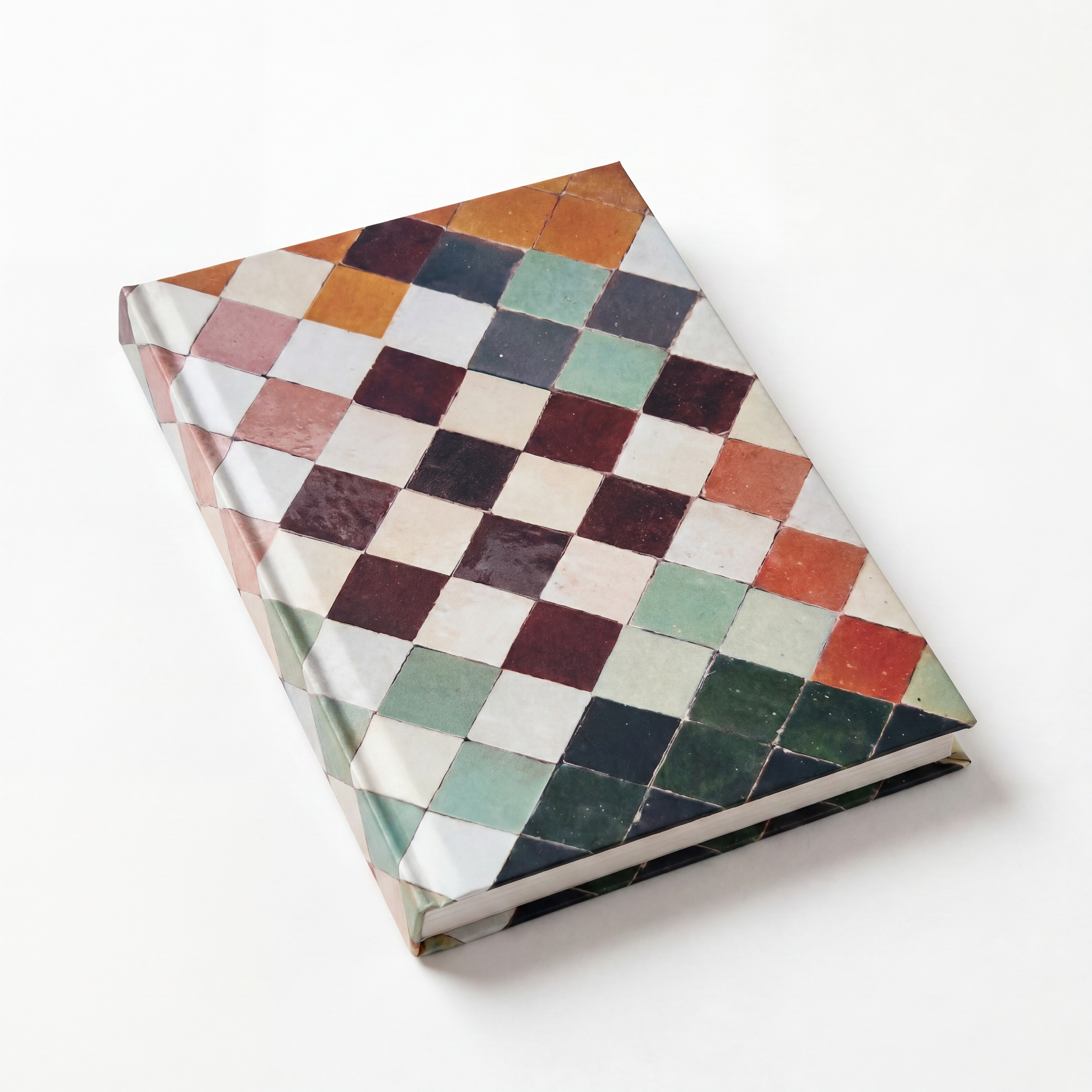 Checkered notebook with multicolor pattern on a white background
