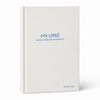 White notebook with blue text on a white background