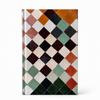 Notebook with a geometric diamond pattern on a white background